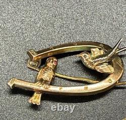Antique rose gold 10k gold ruby swallow bird horseshoe brooch
